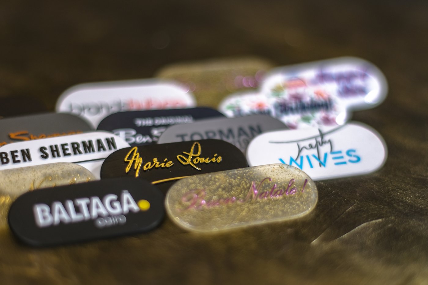 Branded hanger plaques in different finishes