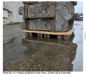 Pulp pallet soaked in water with 4 tons of concrete on top